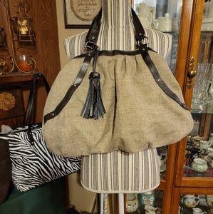 Big tan purse or tote by Usher